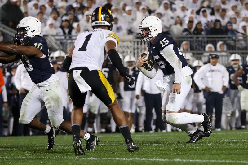 Sep 23, 2023; University Park, Pennsylvania, USA; Penn State Nittany Lions quarterback Drew Allar (15) runs with the ball during the fourth quarter against the Iowa Hawkeyes at Beaver Stadium. Penn State defeated Iowa 31-0. Mandatory Credit: Matthew O'Haren-USA TODAY Sports