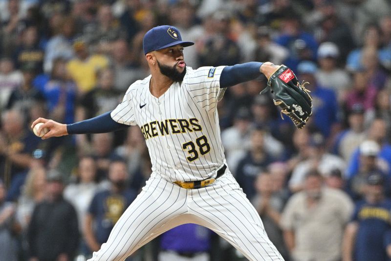 Sep 7, 2024; Milwaukee, Wisconsin, USA; Milwaukee Brewers pitcher Devin Williams (38) delivers a pitch against the Colorado Rockies in the ninth inning at American Family Field. Mandatory Credit: Michael McLoone-Imagn Images