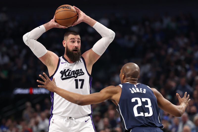 DALLAS, TEXAS - MARCH 03: Jonas Valanciunas #17 of the Sacramento Kings looks for an opening against Kai Jones #23 of the Dallas Mavericks during the first half at American Airlines Center on March 03, 2025 in Dallas, Texas. NOTE TO USER: User expressly acknowledges and agrees that, by downloading and/or using this photograph, user is consenting to the terms and conditions of the Getty Images License Agreement. (Photo by Sam Hodde/Getty Images)