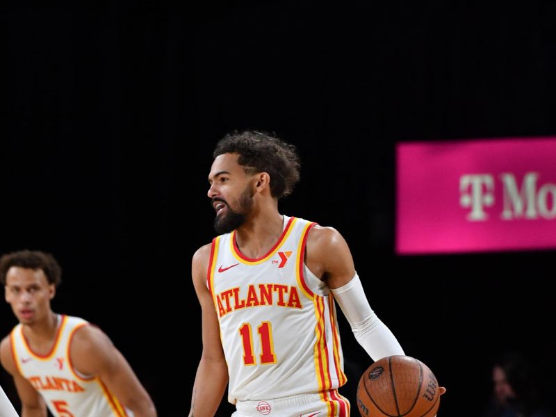 LAS VEGAS, NV - DECEMBER 14: Trae Young #11 of the Atlanta Hawks dribbles the ball during the game against the Milwaukee Bucks during the Emirates NBA Cup Semifinal game on December 14, 2024 at T-Mobile Arena in Las Vegas, Nevada. NOTE TO USER: User expressly acknowledges and agrees that, by downloading and/or using this Photograph, user is consenting to the terms and conditions of the Getty Images License Agreement. Mandatory Copyright Notice: Copyright 2024 NBAE (Photo by Juan Ocampo/NBAE via Getty Images)