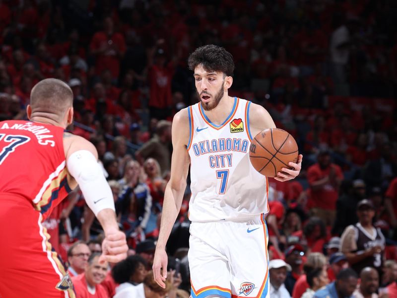 NEW ORLEANS, LA - APRIL 27:  Chet Holmgren #7 of the Oklahoma City Thunder handles the ball during the game against the New Orleans Pelicans during Round 1 Game 3 of the 2024 NBA Playoffs on April 27, 2024 at the Smoothie King Center in New Orleans, Louisiana. NOTE TO USER: User expressly acknowledges and agrees that, by downloading and or using this Photograph, user is consenting to the terms and conditions of the Getty Images License Agreement. Mandatory Copyright Notice: Copyright 2024 NBAE (Photo by Jeff Haynes/NBAE via Getty Images)