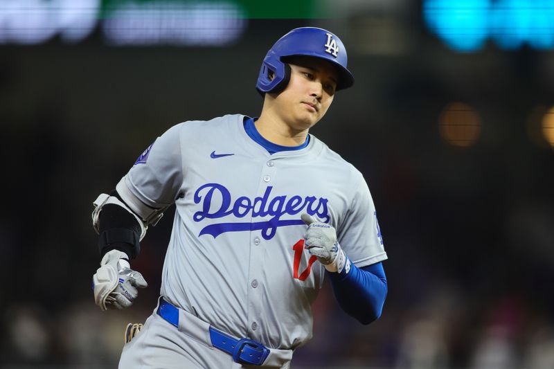 Sep 19, 2024; Miami, Florida, USA; Los Angeles Dodgers designated hitter Shohei Ohtani (17) circles the bases after hitting a two-run home run against the Miami Marlins during the sixth inning at loanDepot Park. Mandatory Credit: Sam Navarro-Imagn Images