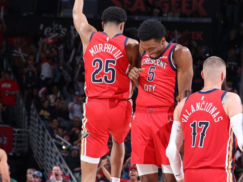 NEW ORLEANS, LA - APRIL 19:  Trey Murphy III #25 of the New Orleans Pelicans & Herb Jones #5 of the New Orleans Pelicans celebrate during the game against the Sacramento Kings during the 2024 Play-In Tournament on April 19, 2024 at the Smoothie King Center in New Orleans, Louisiana. NOTE TO USER: User expressly acknowledges and agrees that, by downloading and or using this Photograph, user is consenting to the terms and conditions of the Getty Images License Agreement. Mandatory Copyright Notice: Copyright 2024 NBAE (Photo by Jeff Haynes./NBAE via Getty Images)