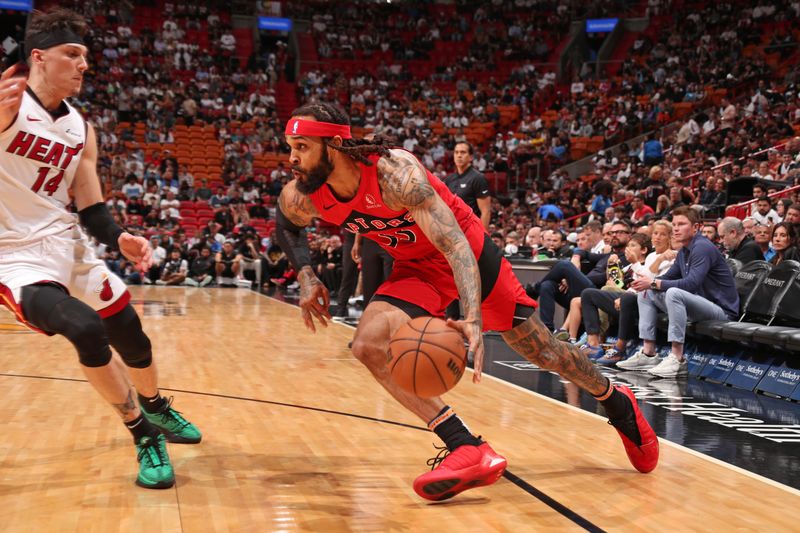 MIAMI, FL - APRIL 12:  Gary Trent Jr. #33 of the Toronto Raptors dribbles the ball during the game against the Miami Heat on April 12, 2024 at Kaseya Center in Miami, Florida. NOTE TO USER: User expressly acknowledges and agrees that, by downloading and or using this Photograph, user is consenting to the terms and conditions of the Getty Images License Agreement. Mandatory Copyright Notice: Copyright 2024 NBAE (Photo by Issac Baldizon/NBAE via Getty Images)