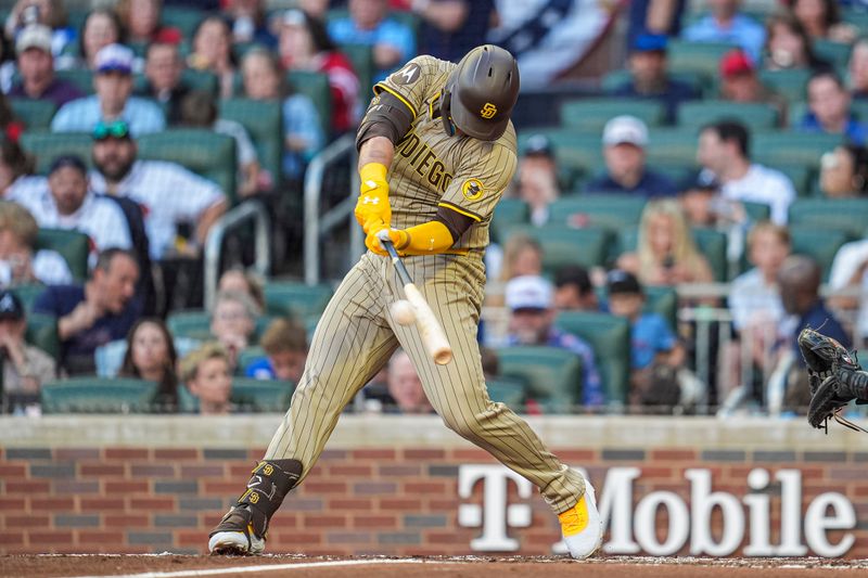 May 23, 2025; Cumberland, Georgia, USA; San Diego Padres designated hitter Gavin Sheets (30) hits a home run against the Atlanta Braves during the second inning at Truist Park. Mandatory Credit: Dale Zanine-Imagn Images