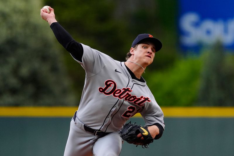 May 7, 2025; Denver, Colorado, USA; Detroit Tigers starting pitcher Jackson Jobe (21) delivers a pitch in the first inning against the Colorado Rockies at Coors Field. Mandatory Credit: Ron Chenoy-Imagn Images