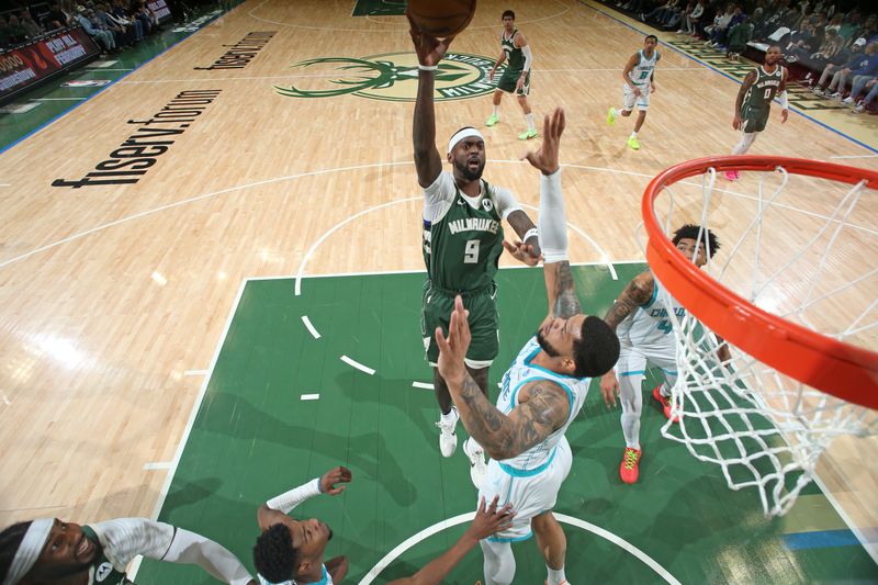 MILWAUKEE, WI - FEBRUARY 9: Bobby Portis #9 of the Milwaukee Bucks drives to the basket during the game against the Charlotte Hornets on February 9, 2024 at the Fiserv Forum Center in Milwaukee, Wisconsin. NOTE TO USER: User expressly acknowledges and agrees that, by downloading and or using this Photograph, user is consenting to the terms and conditions of the Getty Images License Agreement. Mandatory Copyright Notice: Copyright 2024 NBAE (Photo by Gary Dineen/NBAE via Getty Images).