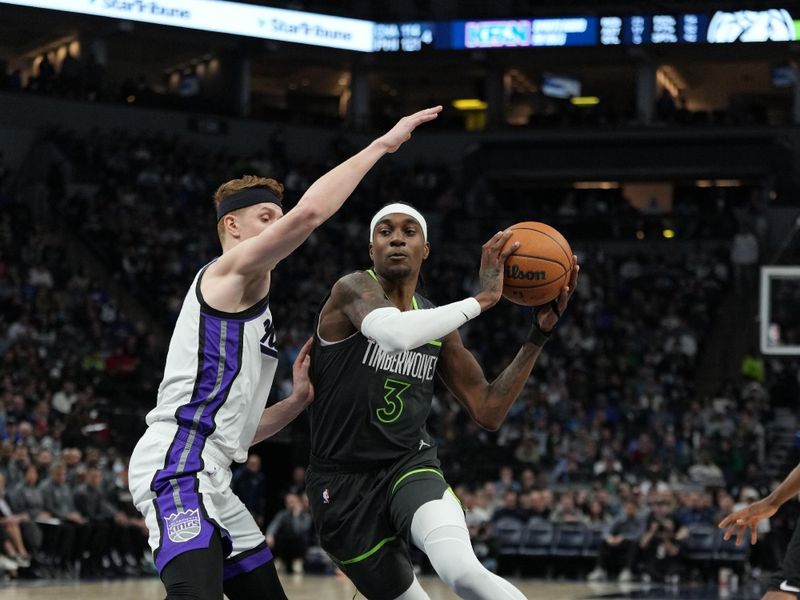 MINNEAPOLIS, MN -  MARCH 1: Jaden McDaniels #3 of the Minnesota Timberwolves handles the ball during the game against the Sacramento Kings on March 1, 2024 at Target Center in Minneapolis, Minnesota. NOTE TO USER: User expressly acknowledges and agrees that, by downloading and or using this Photograph, user is consenting to the terms and conditions of the Getty Images License Agreement. Mandatory Copyright Notice: Copyright 2024 NBAE (Photo by Jordan Johnson/NBAE via Getty Images)