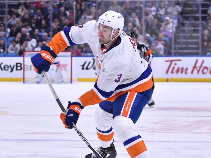 Oct 21, 2023; Buffalo, New York, USA; New York Islanders defenseman Adam Pelech (3) shoots the puck in the first period against the Buffalo Sabres at KeyBank Center. Mandatory Credit: Mark Konezny-USA TODAY Sports