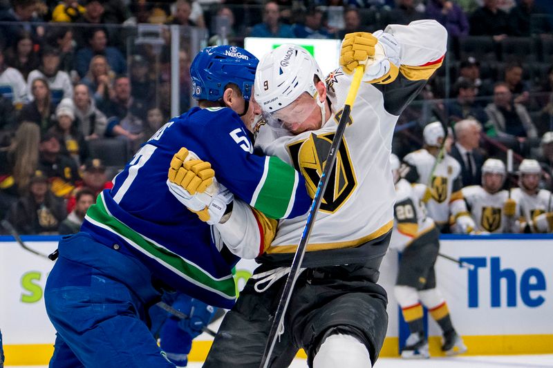 Apr 8, 2024; Vancouver, British Columbia, CAN; Vancouver Canucks defenseman Tyler Myers (57) checks Vegas Golden Knights forward Jack Eichel (9) in the second period  at Rogers Arena. Mandatory Credit: Bob Frid-USA TODAY Sports