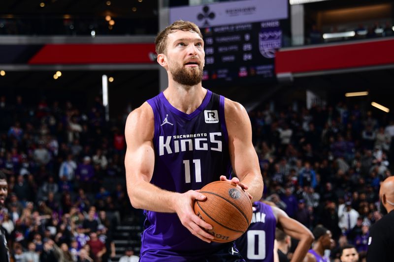 SACRAMENTO, CA - DECEMBER 3: Domantas Sabonis #11 of the Sacramento Kings shoots a free throw during the game against the Houston Rockets during the Emirates NBA Cup game on December 3, 2024 at Golden 1 Center in Sacramento, California. NOTE TO USER: User expressly acknowledges and agrees that, by downloading and or using this Photograph, user is consenting to the terms and conditions of the Getty Images License Agreement. Mandatory Copyright Notice: Copyright 2024 NBAE (Photo by Adam Pantozzi/NBAE via Getty Images)