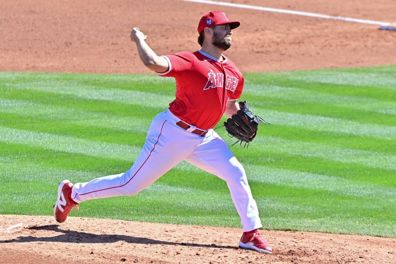 Feb 29, 2024; Tempe, Arizona, USA;  Los Angeles Angels starting pitcher Chase Silseth (63) throws in the third inning against the Cleveland Guardians during a spring training game at Tempe Diablo Stadium. Mandatory Credit: Matt Kartozian-USA TODAY Sports