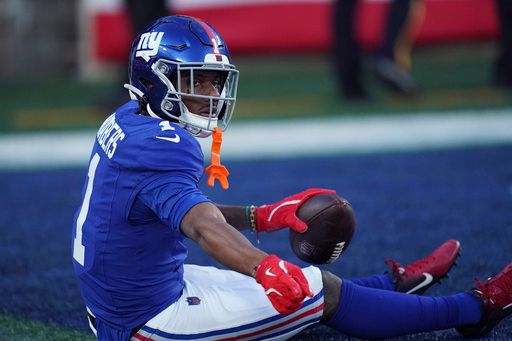 New York Giants wide receiver Malik Nabers (1) catches the pass for a touchdown during an NFL football game against the New Orlean Saints, Sunday, Nov. 17, 2024 in East Rutherford, N.J. The Saints defeated the Giants 14-11. (AP Photo/Vera Nieuwenhuis)