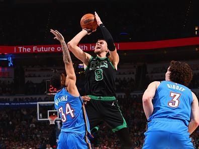 OKLAHOMA CITY, OK - JANUARY 2: Kristaps Porzingis #8 of the Boston Celtics shoots the ball during the game against the Oklahoma City Thunder on January 2, 2024 at Paycom Arena in Oklahoma City, Oklahoma. NOTE TO USER: User expressly acknowledges and agrees that, by downloading and or using this photograph, User is consenting to the terms and conditions of the Getty Images License Agreement. Mandatory Copyright Notice: Copyright 2024 NBAE (Photo by Zach Beeker/NBAE via Getty Images)