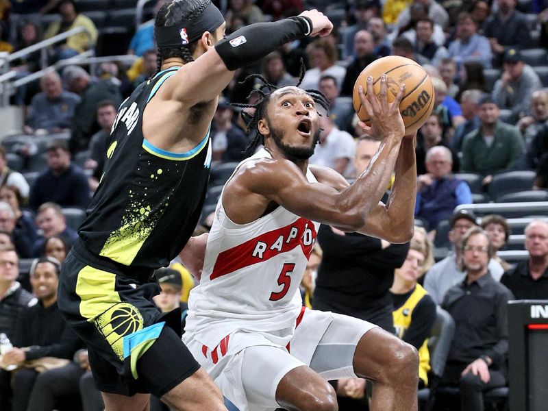 INDIANAPOLIS, INDIANA - FEBRUARY 26:   Immanuel Quickley #5 of the Toronto Raptors dribbles the ball against the Indiana Pacers at Gainbridge Fieldhouse on February 26, 2024 in Indianapolis, Indiana.    NOTE TO USER: User expressly acknowledges and agrees that, by downloading and or using this photograph, User is consenting to the terms and conditions of the Getty Images License Agreement.  (Photo by Andy Lyons/Getty Images)