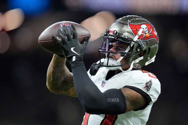 Tampa Bay Buccaneers wide receiver Sterling Shepard warms up before an NFL football game against the New Orleans Saints in New Orleans, Sunday, Oct. 13, 2024. (AP Photo/Michael Conroy)