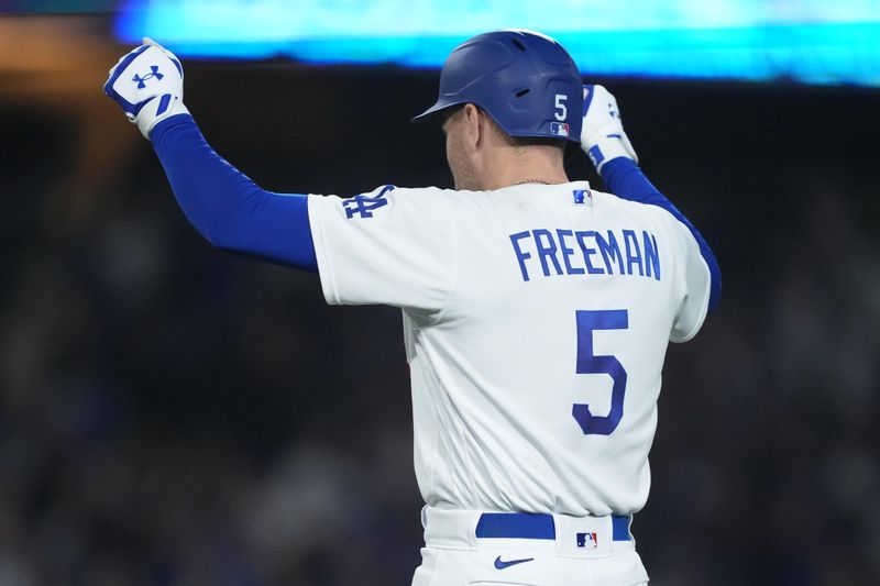 Jun 15, 2023; Los Angeles, California, USA; Los Angeles Dodgers first baseman Freddie Freeman (5) after hitting a walk-off single in the 11th inning against the Chicago White Sox at Dodger Stadium. Mandatory Credit: Kirby Lee-USA TODAY Sports