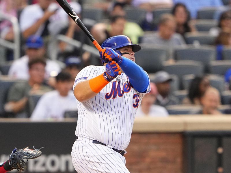 Aug 30, 2023; New York City, New York, USA;  New York Mets designated hitter Daniel Vogelbach (32) hits a home run against the Texas Rangers during the second inning at Citi Field. Mandatory Credit: Gregory Fisher-USA TODAY Sports