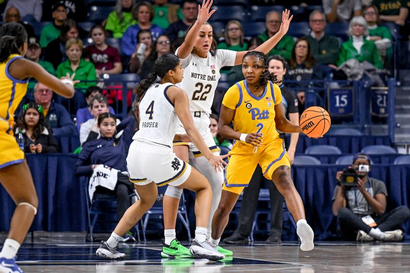 Feb 9, 2023; South Bend, Indiana, USA; Pittsburgh Panthers forward Liatu King (2) looks to pass as Notre Dame Fighting Irish guard Cassandre Prosper (4) and forward Kylee Watson (22) defend in the second half at the Purcell Pavilion. Mandatory Credit: Matt Cashore-USA TODAY Sports