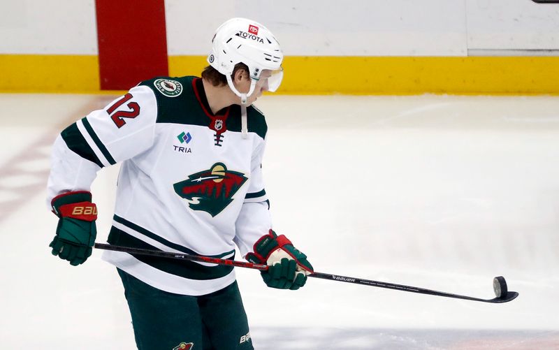 Apr 6, 2023; Pittsburgh, Pennsylvania, USA; Minnesota Wild left wing Matt Boldy (12) warms up before the game against the Pittsburgh Penguins at PPG Paints Arena. Mandatory Credit: Charles LeClaire-USA TODAY Sports