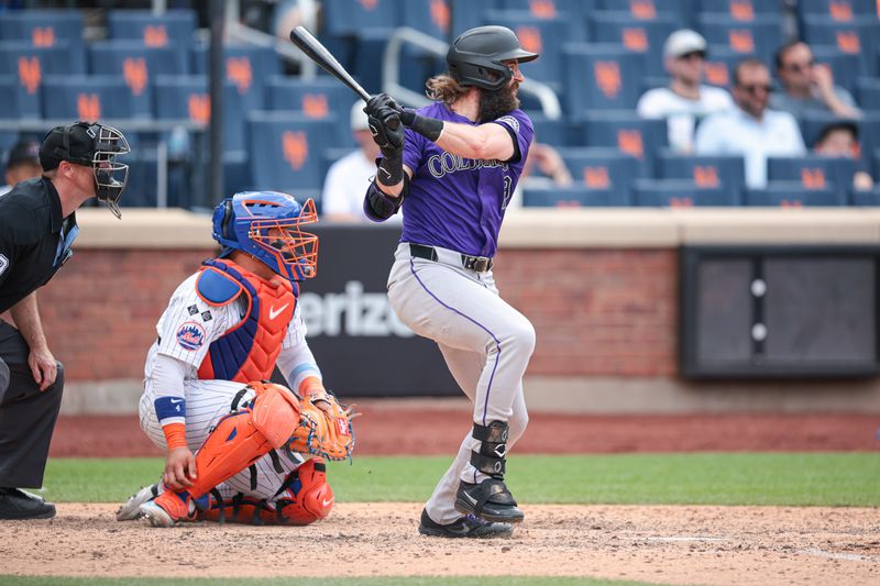 Jul 14, 2024; New York City, New York, USA; Colorado Rockies designated hitter Charlie Blackmon (19) singles during the ninth inning against the New York Mets at Citi Field. Mandatory Credit: Vincent Carchietta-USA TODAY Sports