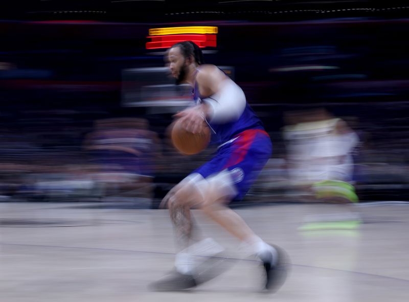 LOS ANGELES, CALIFORNIA - APRIL 12: Amir Coffey #7 of the LA Clippers dribbles during a 110-109 loss to the Utah Jazz at Crypto.com Arena on April 12, 2024 in Los Angeles, California. User is consenting to the terms and conditions of the Getty Images License Agreement.  (Photo by Harry How/Getty Images)