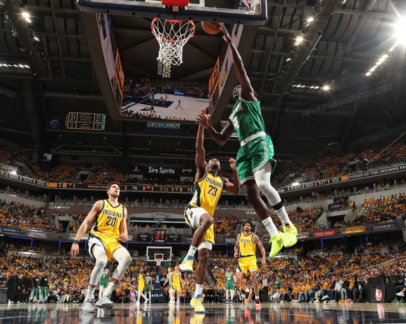 INDIANAPOLIS, IN - MAY 27: Jrue Holiday #4 of the Boston Celtics drives to the basket during the game against the Indiana Pacers during Game 4 of the Eastern Conference Finals of the 2024 NBA Playoffs on May 27, 2024 at Gainbridge Fieldhouse in Indianapolis, Indiana. NOTE TO USER: User expressly acknowledges and agrees that, by downloading and or using this Photograph, user is consenting to the terms and conditions of the Getty Images License Agreement. Mandatory Copyright Notice: Copyright 2024 NBAE (Photo by Nathaniel S. Butler/NBAE via Getty Images)