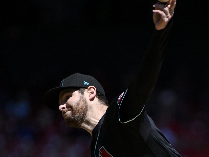 Apr 24, 2024; St. Louis, Missouri, USA;  Arizona Diamondbacks starting pitcher Jordan Montgomery (52) pitches against the St. Louis Cardinals during the first inning at Busch Stadium. Mandatory Credit: Jeff Curry-USA TODAY Sports