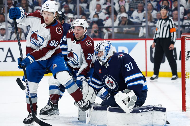 Colorado Avalanche and Winnipeg Jets Prepare for a Thrilling Battle at Ball Arena; Nathan MacKin...