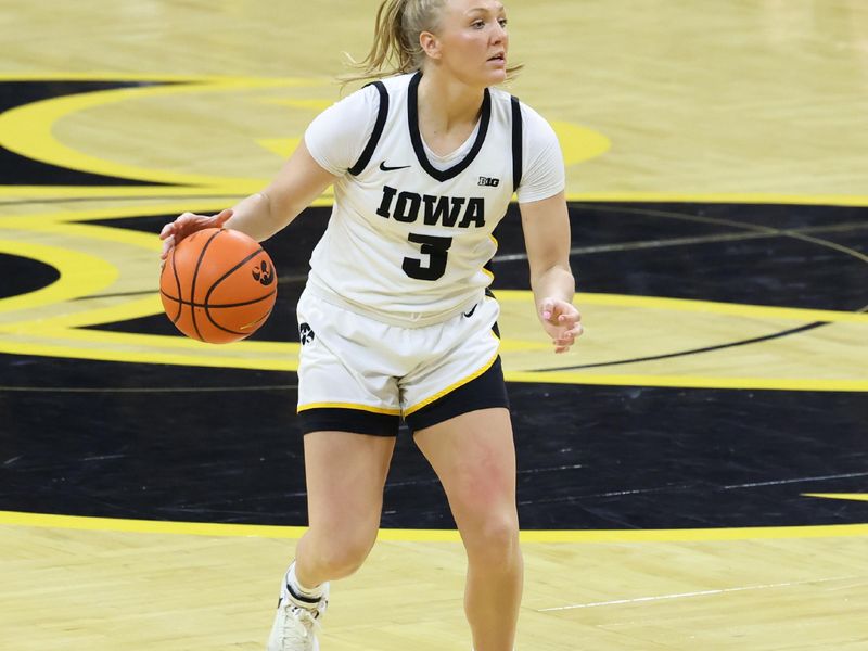 Mar 3, 2024; Iowa City, Iowa, USA; Iowa Hawkeyes guard Sydney Affolter (3) sets the offense against the Ohio State Buckeyes during the first half at Carver-Hawkeye Arena. Mandatory Credit: Reese Strickland-USA TODAY Sports