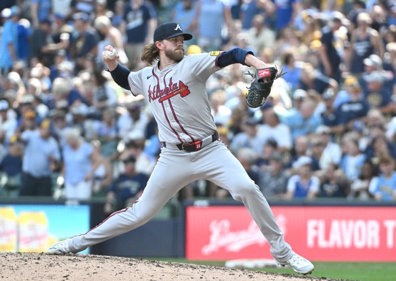 Jul 31, 2024; Milwaukee, Wisconsin, USA;  Atlanta Braves pitcher Pierce Johnson (38) delivers against the Milwaukee Brewers in the sixth inning at American Family Field. Mandatory Credit: Michael McLoone-USA TODAY Sports