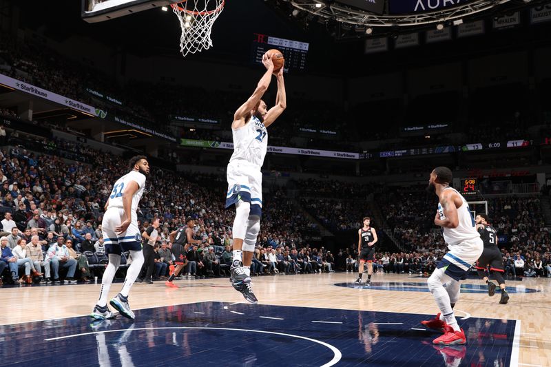 MINNEAPOLIS, MN -  FEBRUARY 4: Rudy Gobert #27 of the Minnesota Timberwolves grabs a rebound during the game against the Houston Rockets on February 4, 2024 at Target Center in Minneapolis, Minnesota. NOTE TO USER: User expressly acknowledges and agrees that, by downloading and or using this Photograph, user is consenting to the terms and conditions of the Getty Images License Agreement. Mandatory Copyright Notice: Copyright 2024 NBAE (Photo by David Sherman/NBAE via Getty Images)