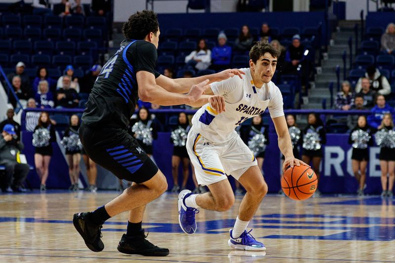 Jan 13, 2024; Colorado Springs, Colorado, USA; San Jose State Spartans guard Alvaro Cardenas (13) controls the ball as Air Force Falcons guard Jeffrey Mills (24) guards in the second half at Clune Arena. Mandatory Credit: Isaiah J. Downing-USA TODAY Sports