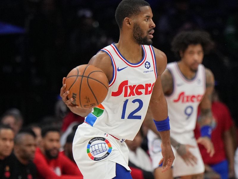 PHILADELPHIA, PA - FEBRUARY 11:  Jared Butler #12 of the Philadelphia 76ers dribbles the ball during the game against the Toronto Raptors  on February 11, 2025 at the Wells Fargo Center in Philadelphia, Pennsylvania NOTE TO USER: User expressly acknowledges and agrees that, by downloading and/or using this Photograph, user is consenting to the terms and conditions of the Getty Images License Agreement. Mandatory Copyright Notice: Copyright 2025 NBAE (Photo by Jesse D. Garrabrant/NBAE via Getty Images)