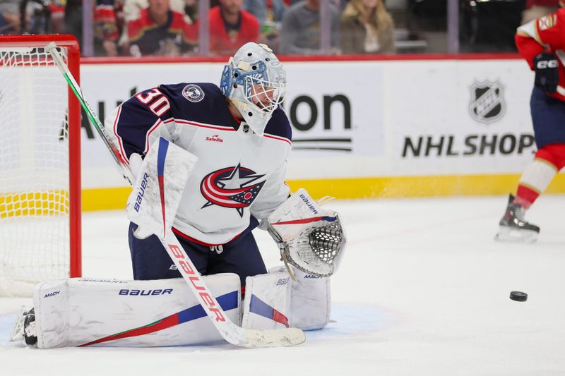 Nov 6, 2023; Sunrise, Florida, USA; Columbus Blue Jackets goaltender Spencer Martin (30) makes a save against the Florida Panthers during the second period at Amerant Bank Arena. Mandatory Credit: Sam Navarro-USA TODAY Sports