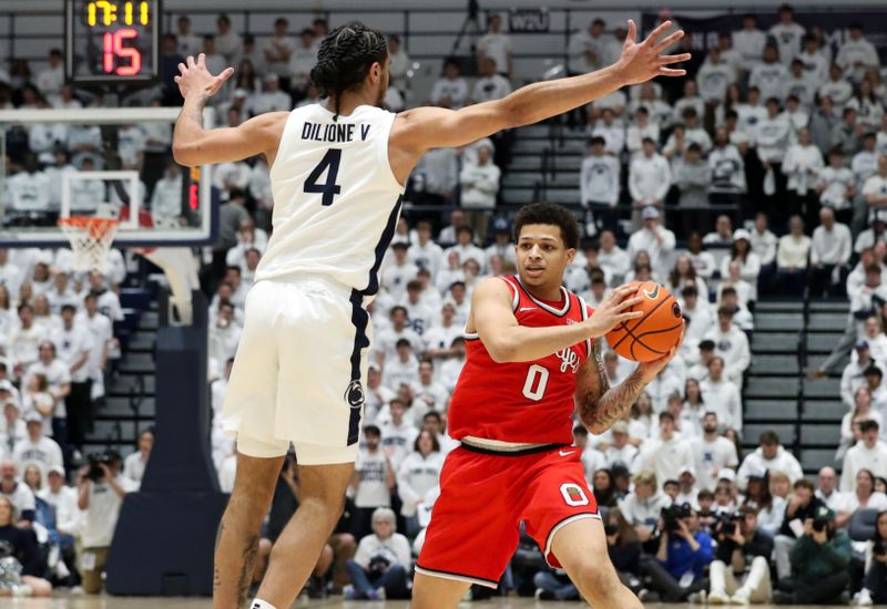 Jan 30, 2025; University Park, Pennsylvania, USA; Ohio State Buckeyes guard John Mobley Jr (0) looks to pass the ball as Penn State Nittany Lions guard Freddie Dilione V (4) defends during the first half at Rec Hall. Mandatory Credit: Matthew O'Haren-Imagn Images