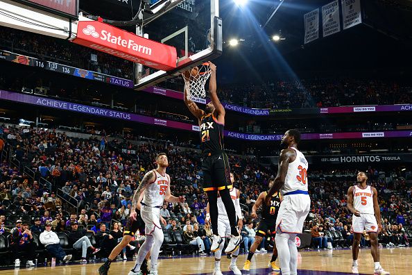 PHOENIX, AZ - DECEMBER 15: Keita Bates-Diop #21 of the Phoenix Suns dunks the ball during the game against the New York Knicks on December 15, 2023 at Footprint Center in Phoenix, Arizona. NOTE TO USER: User expressly acknowledges and agrees that, by downloading and or using this photograph, user is consenting to the terms and conditions of the Getty Images License Agreement. Mandatory Copyright Notice: Copyright 2023 NBAE (Photo by Kate Frese/NBAE via Getty Images)