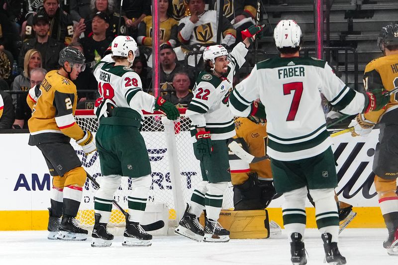 Apr 12, 2024; Las Vegas, Nevada, USA; Minnesota Wild center Marat Khusnutdinov (22) celebrates after scoring a goal against the Vegas Golden Knights during the second period at T-Mobile Arena. Mandatory Credit: Stephen R. Sylvanie-USA TODAY Sports