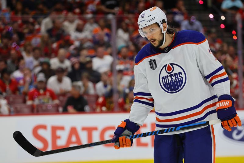 Jun 10, 2024; Sunrise, Florida, USA; Edmonton Oilers forward Mattias Janmark (13) skates between play against the Florida Panthers during the second period  in game two of the 2024 Stanley Cup Final at Amerant Bank Arena. Mandatory Credit: Sam Navarro-USA TODAY Sports