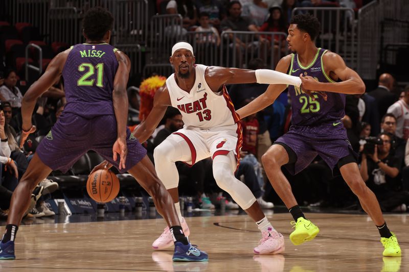 MIAMI, FL - OCTOBER 22: Bam Adebayo #13 of the Miami Heat dribbles the ball during the game against the New Orleans Pelicans on January 1, 2025 at Kaseya Center in Miami, Florida. NOTE TO USER: User expressly acknowledges and agrees that, by downloading and or using this Photograph, user is consenting to the terms and conditions of the Getty Images License Agreement. Mandatory Copyright Notice: Copyright 2025 NBAE (Photo by Issac Baldizon/NBAE via Getty Images)