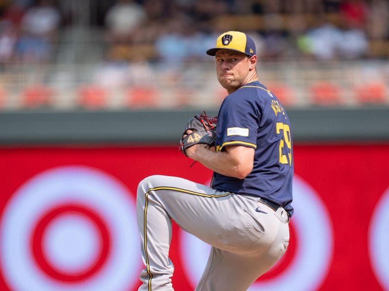 Jul 21, 2024; Minneapolis, Minnesota, USA; Milwaukee Brewers pitcher Trevor Megill (29) pitches in the ninth inning against the Minnesota Twins at Target Field. Mandatory Credit: Matt Blewett-USA TODAY Sports