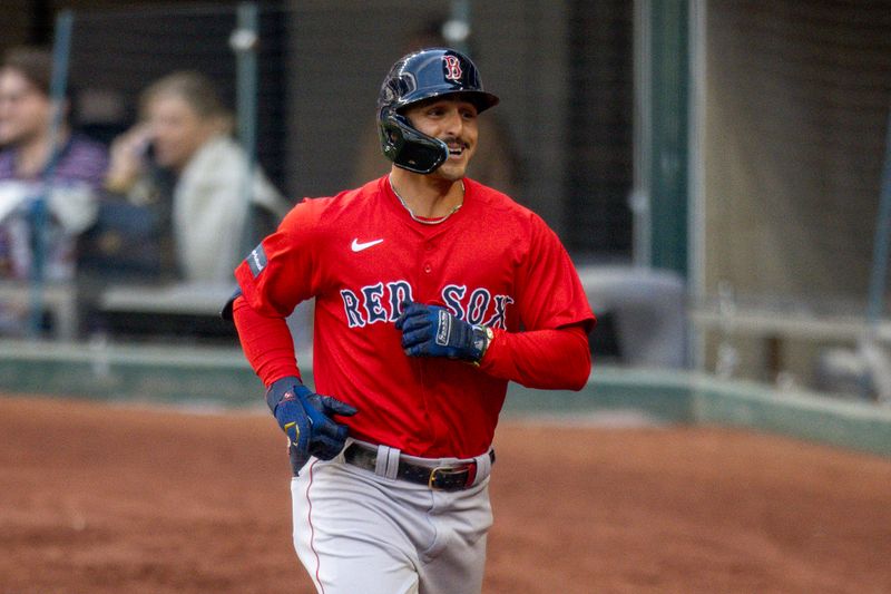 Mar 26, 2024; Arlington, Texas, USA; Boston Red Sox center fielder Mark Contreras (59) smiles as he runs off the field after he hits a home run against the Texas Rangers at Globe Life Field. Mandatory Credit: Jerome Miron-USA TODAY Sports