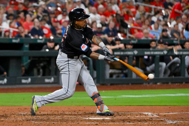 Sep 20, 2024; St. Louis, Missouri, USA;  Cleveland Guardians third baseman Jose Ramirez (11) hits a single against the St. Louis Cardinals during the seventh inning at Busch Stadium. Mandatory Credit: Jeff Curry-Imagn Images