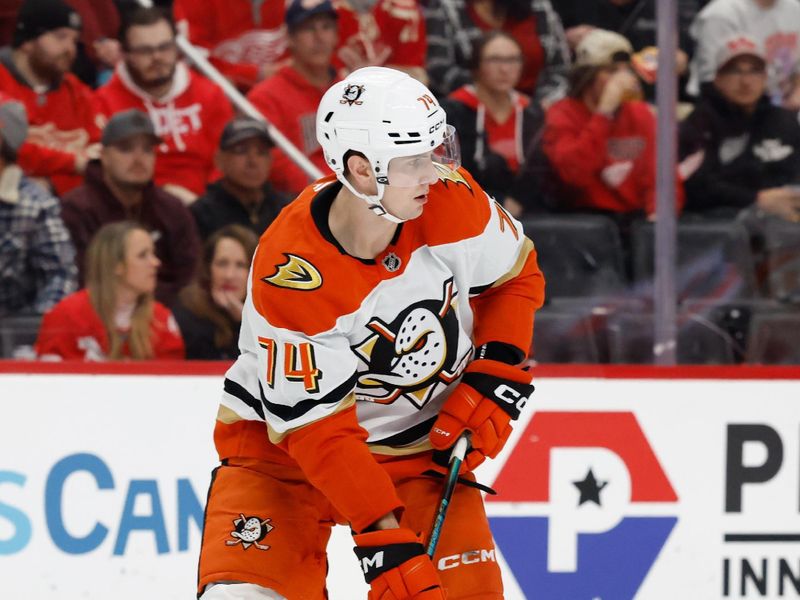 Nov 13, 2025; Detroit, Michigan, USA;  Anaheim Ducks defenseman Drew Helleson (14) skates with the puck in the second period against the Detroit Red Wings at Little Caesars Arena. Mandatory Credit: Rick Osentoski-Imagn Images