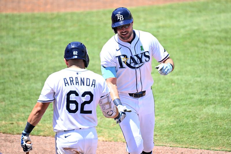 May 21, 2025; St. Petersburg, Florida, USA; Tampa Bay Rays right fielder Josh Lowe (15) celebrates with first baseman Jonathan Aranda (62) after hitting a solo home run on the fifth  inning against the Houston Astros at George M. Steinbrenner Field. Mandatory Credit: Jonathan Dyer-Imagn Images