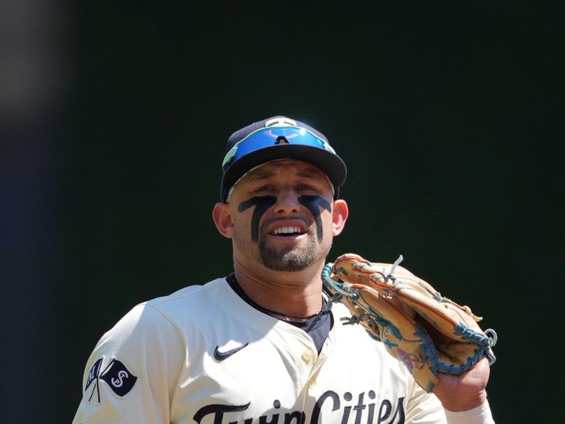 Aug 11, 2024; Minneapolis, Minnesota, USA; Minnesota Twins third baseman Royce Lewis (23) makes the catch for the out during the first inning against the Cleveland Guardians at Target Field. Mandatory Credit: Jordan Johnson-USA TODAY Sports