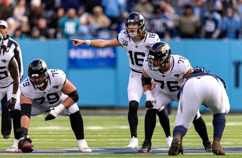 Jacksonville Jaguars quarterback Trevor Lawrence (16) calls a play at the line during their NFL football game against the Tennessee Titans Sunday, Jan. 7, 2024, in Nashville, Tenn. (AP Photo/Wade Payne)