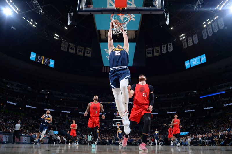 DENVER, CO - JANUARY 17: Nikola Jokic #15 of the Denver Nuggets dunks the ball during the game against the Portland Trail Blazers on January 17, 2023 at the Ball Arena in Denver, Colorado. NOTE TO USER: User expressly acknowledges and agrees that, by downloading and/or using this Photograph, user is consenting to the terms and conditions of the Getty Images License Agreement. Mandatory Copyright Notice: Copyright 2023 NBAE (Photo by Bart Young/NBAE via Getty Images)