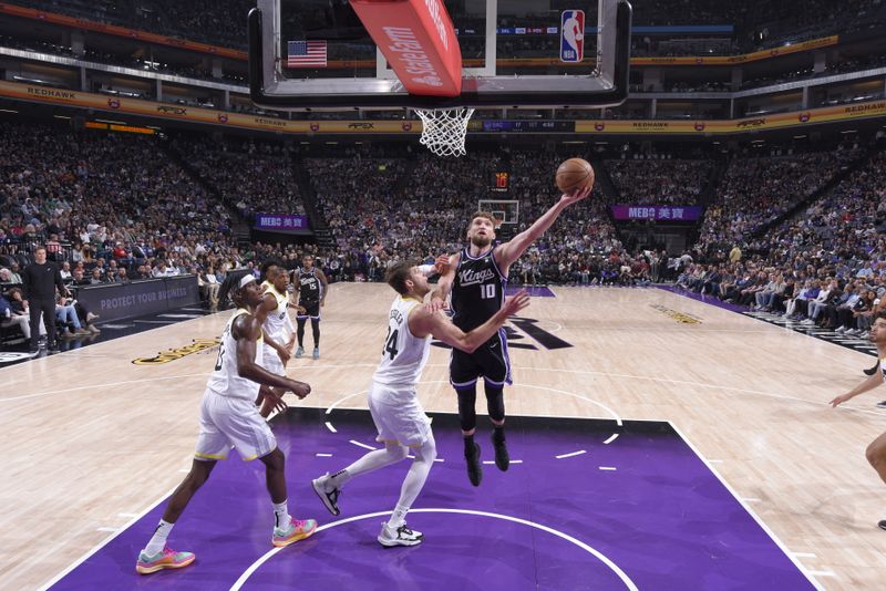 SACRAMENTO, CA - MARCH 31: Domantas Sabonis #10 of the Sacramento Kings drives to the basket during the game against the Utah Jazz on March 31, 2024 at Golden 1 Center in Sacramento, California. NOTE TO USER: User expressly acknowledges and agrees that, by downloading and or using this Photograph, user is consenting to the terms and conditions of the Getty Images License Agreement. Mandatory Copyright Notice: Copyright 2024 NBAE (Photo by Rocky Widner/NBAE via Getty Images)