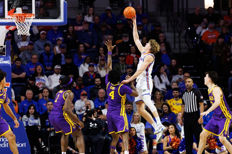 Jan 20, 2026; Gainesville, Florida, USA; Florida Gators forward Thomas Haugh (10) shoots the ball over Louisiana State Tigers guard Rashad King (4) during the first half at Exactech Arena at the Stephen C. O'Connell Center. Mandatory Credit: Matt Pendleton-Imagn Images